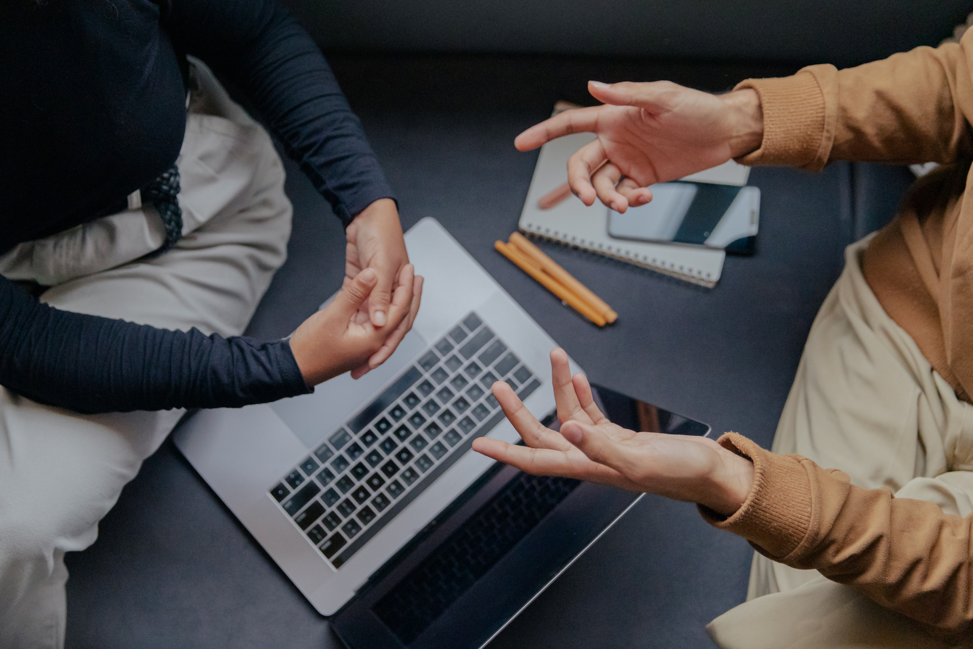 Top View of Two Business Partners Collaborating Together
